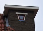 Een close-up van een raampje op de bovenste verdieping.
<br/>
Richard Keijzer, 2016-01-05